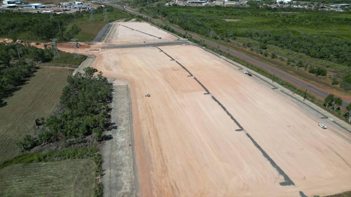Aerial view of prepared industrial land at Wishart Estate showing site works and large-scale lot development