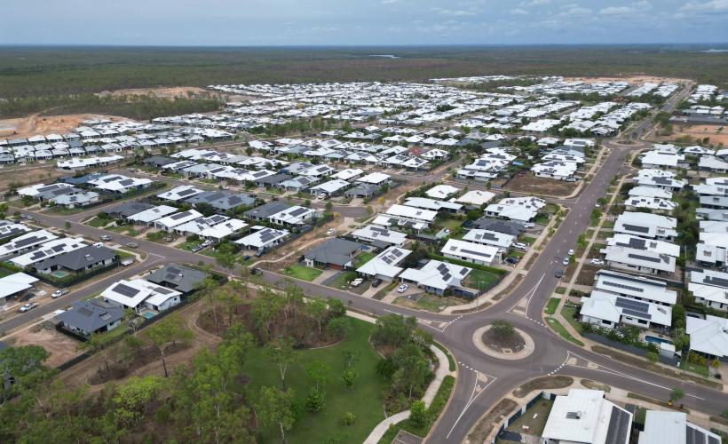 Aerial view of Zuccoli Village showing established residential streets, housing and surrounding green space in Darwin